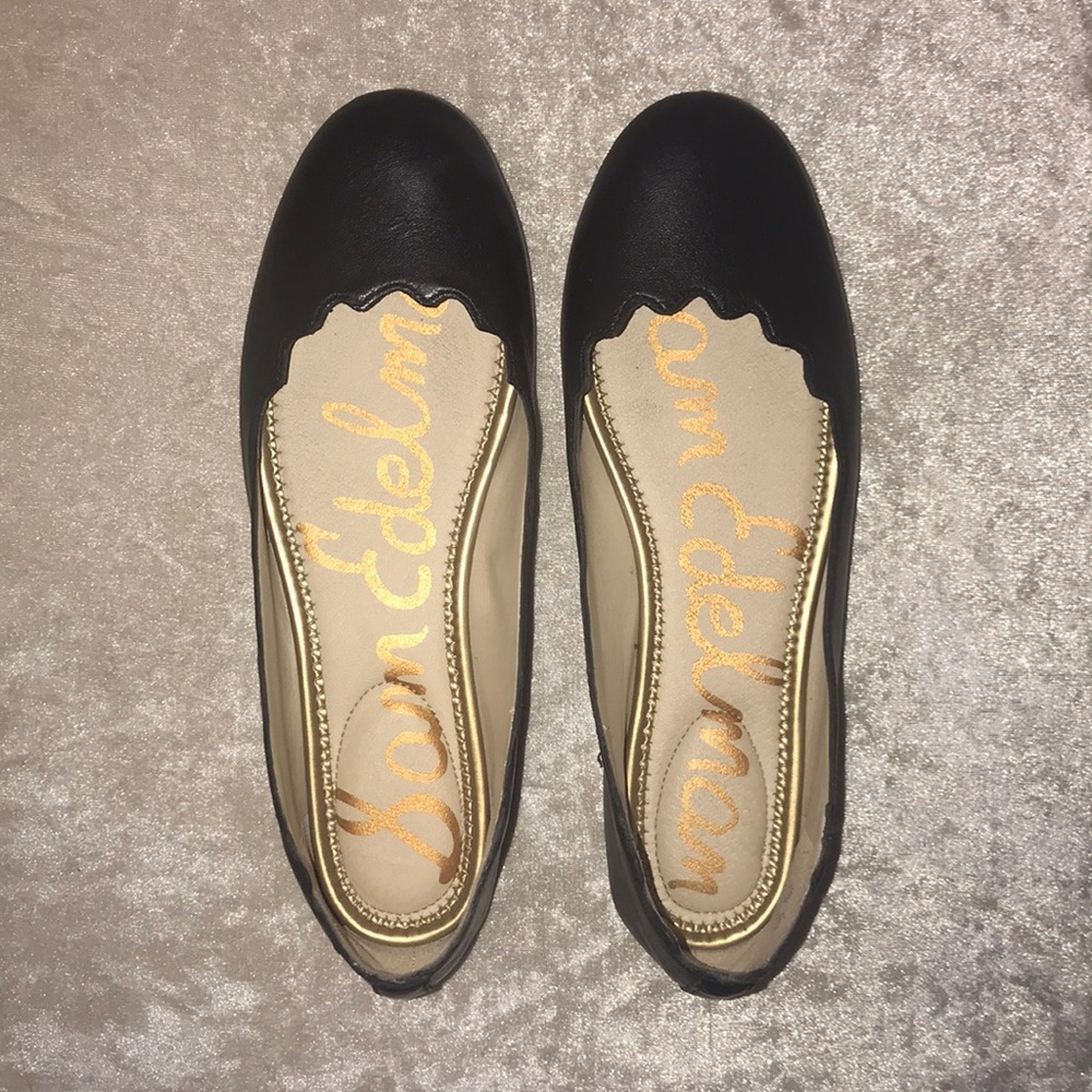 Sam Edelman flats with scalloped edges.